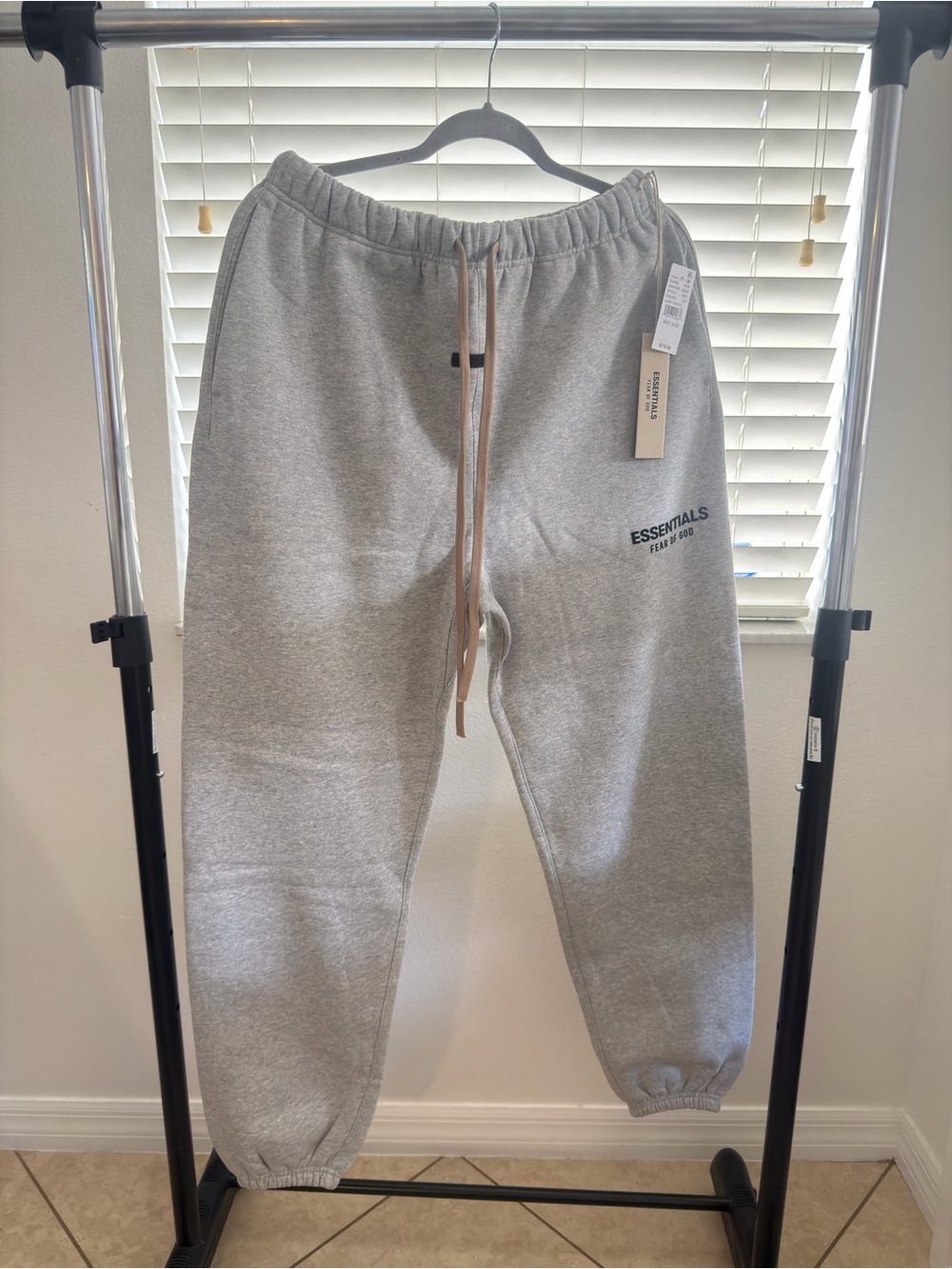Fear of God Essentials Light Gray Fleece Joggers